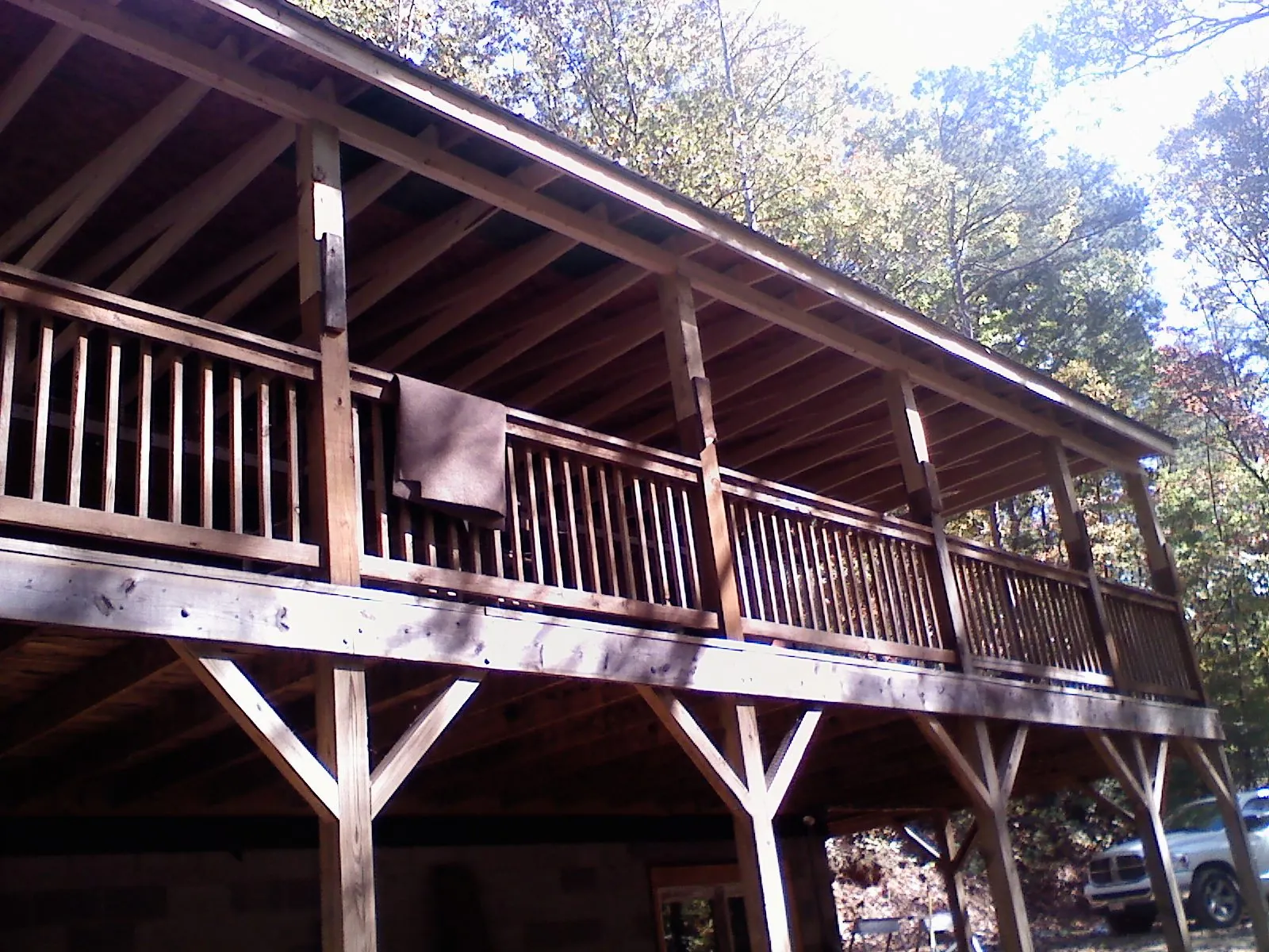 Timber framing under a new elevated porch and deck — Roof Leak Repair in Story City by Roofing Brothers